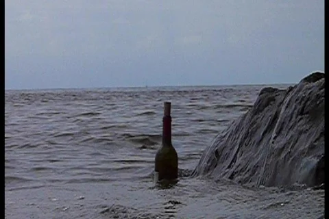 Bottle and sea Stock Footage