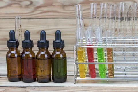 Bottle and Stand with test tubes. Several chemical solution in flask. Labor.. Stockfoto's