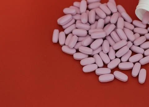 Bottle and tablets Stock Photos