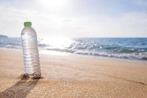 Bottle on the beach. Stock Photos
