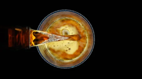 Bottle of beer being poured into glass Stock Footage 45294268