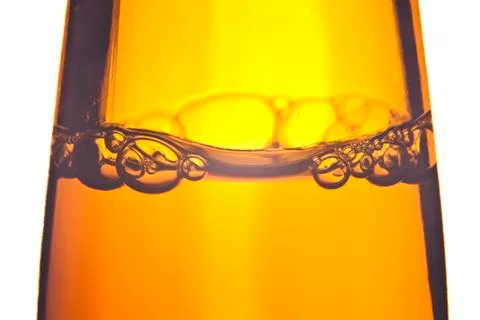 Bottle of beer with bubbles Stock Photos