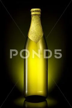 Bottle of beer with golden foil isolated on black Stock Photos
