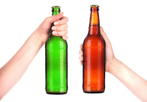 Bottle of beer with man hand making toast isolated on white Stock Photos