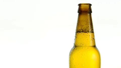 Bottle of beer with water drop falling Stock Footage 75206603