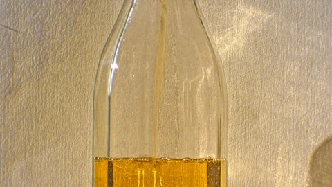 Bottle is being filled with extra virgin olive oil Stock Footage 102952146