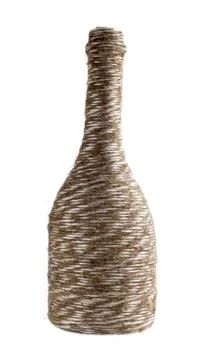 Bottle, braided rope Stock Photos