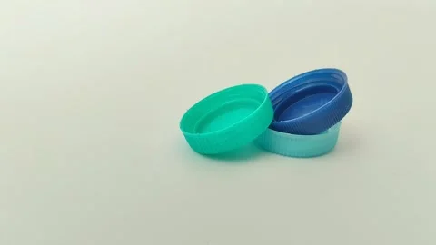 Bottle cap made of plastic on white background Видео 310868814