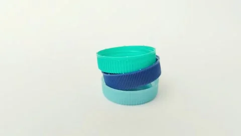 Bottle cap made of plastic on white background Видео 310868815