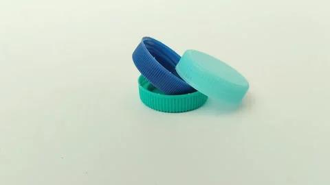 Bottle cap made of plastic on white background Видео 310868837