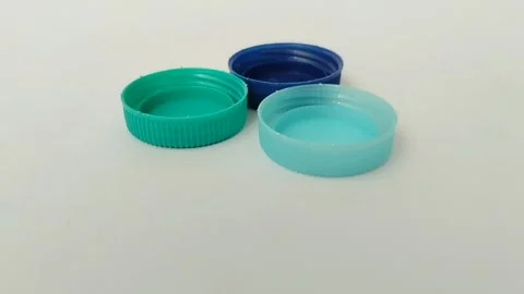 Bottle cap made of plastic on white background Видео 310868844