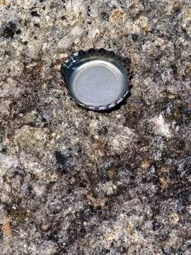 Bottle cap on the stone Stock Photos