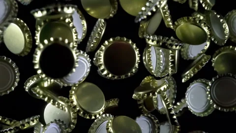 Bottle Caps in Flight 4K TZ4 Stock Footage 340584563