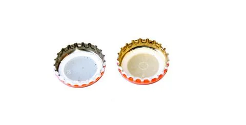 Bottle caps on white background Foto stock