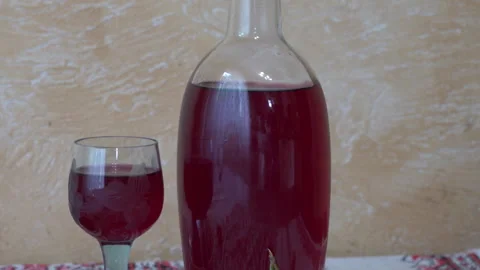 Bottle of cherry liqueur Stock-Footage 304274549