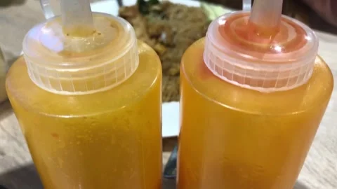 Bottle of chili sauce, often found in restaurants Stock Footage 308690678