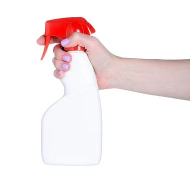 Bottle cleaning spray in hand Stock Photos