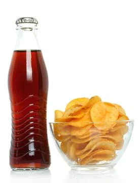 Bottle of cola with potato chips. Stock Photos