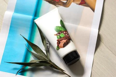 A bottle with a cosmetic in the decor Stock Photos