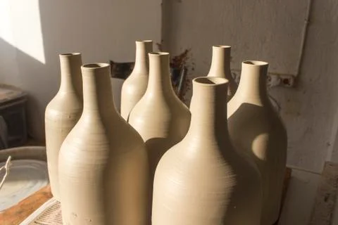 Bottle design from raw ceramic material  Stock Photos