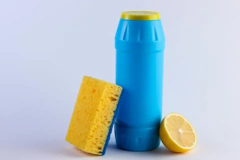 Bottle of detergent and lemon, sponge on a white background. 库存照片