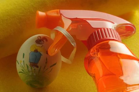 Bottle of detergent with easter egg Foto stock