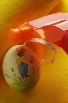 Bottle of detergent with easter egg Stock Photos