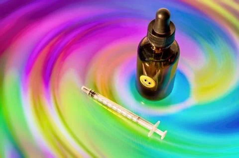 Bottle of diluted LSD used for microdosing Stock Photos