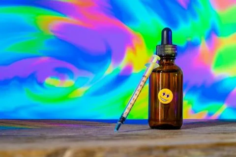 Bottle of diluted LSD used for microdosing Stock Photos
