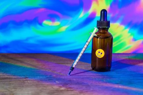 Bottle of diluted LSD used for microdosing Stock Photos