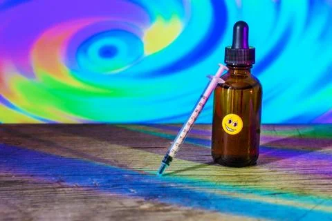 Bottle of diluted LSD used for microdosing Stock Photos