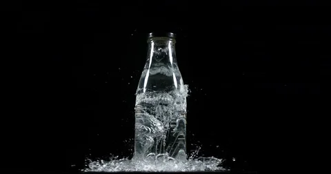 Bottle Falling and exploding on Black Background, Slow Motion 4K 動画素材 75981844