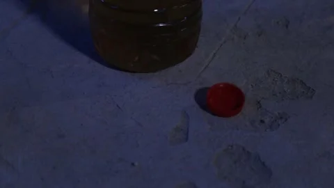 Bottle full of oil 2 Stock Footage 322054635