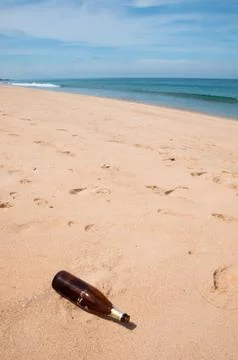 Bottle is garbage at beach Stock Photos