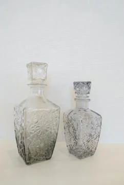 Bottle glass on the table Stock Photos