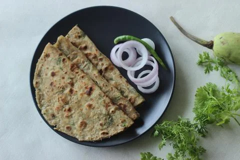 Bottle Gourd Flatbread. Indian flat bread made of whole wheat flour, grated b Stock Photos