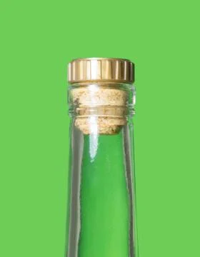 Bottle on green background Stock Photos