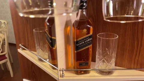 Bottle of Johnnie Walker Black Label Blended Scotch Whisky Stock Footage 155430451