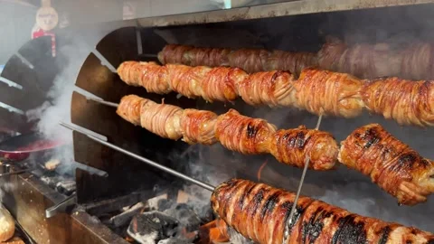 Bottle lined kokorech, lamb intestine meal, turkish kokorec , Turkish Street Stock Footage 250464288
