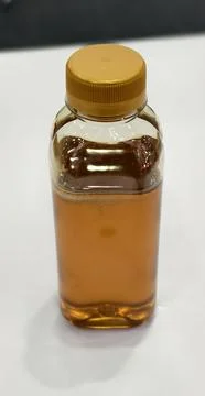 A bottle of liquid honey. Stock Photos