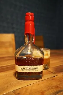 A bottle of 'MAKER'S MARK' bourbon whiskey on wooden table bar Stock Photos