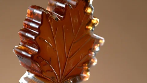 Bottle of maple syrup in slow motion.  Shot with Phantom Flex 4K camera. Video stock 130356406