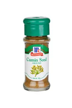 Bottle of McCormick Cumin Seed isolated on a white background Stock Photos