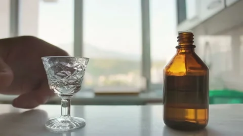 Bottle of medicine, drinking Stock Footage 53246814