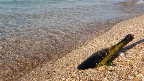 Bottle With A Message On The Beach Stock Footage 137427299