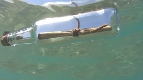 Bottle with a message floats in the sea Stock Footage 72350567