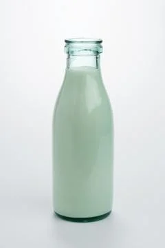 Bottle of milk on white. Clipping path Stock Photos