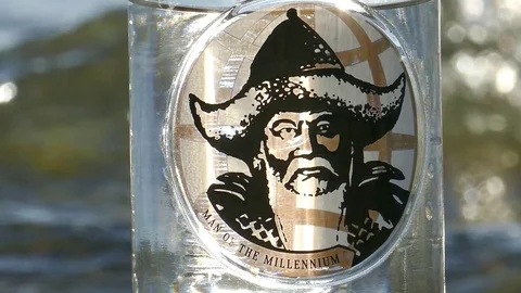 A bottle of Mongolian vodka GINGGIS and a portrait of the Great Khan on it. Stock-Footage 79687535
