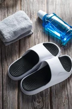Bottle of mouthwash on wooden table Stock Photos