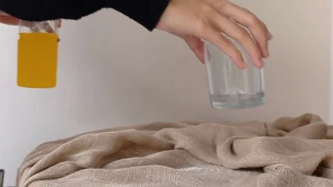 A bottle of orange juice on a table Stock Footage 146249471